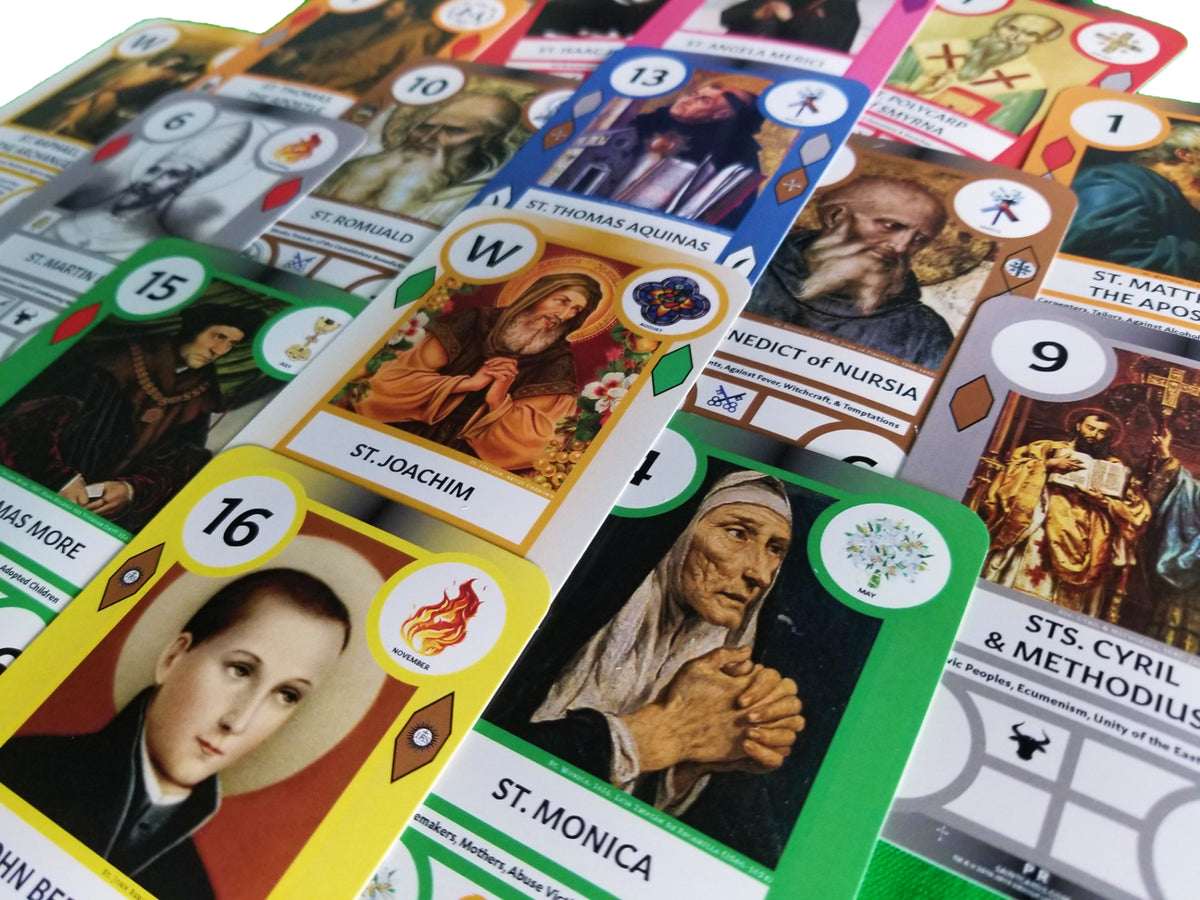 SaintCards: Extraordinary Form Base Game Bundle (106 SaintCards w/Tin, 1960 Calendar Expansion, & Deluxe Blue Game Mat)